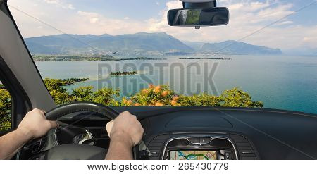 Driving A Car Towards The Scenic Lake Garda, Italy