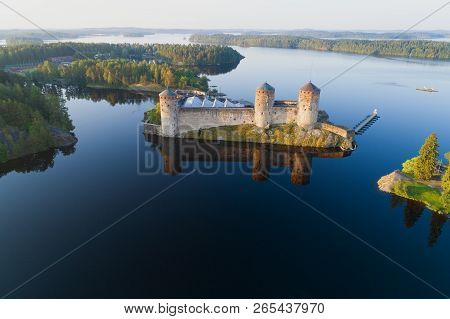 July Morning Over The Olavinlinna Fortress (shooting From A Quadrocopter). Savonlinna, Finland