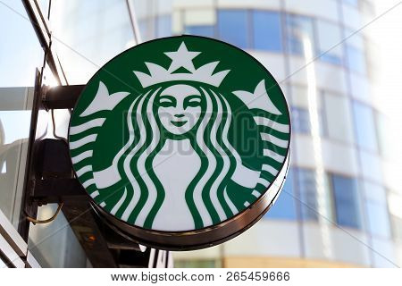 Paris, France - October 16, 2018: Starbucks Coffee Shop Mermaid Logo Is Displayed At The Facade Of A