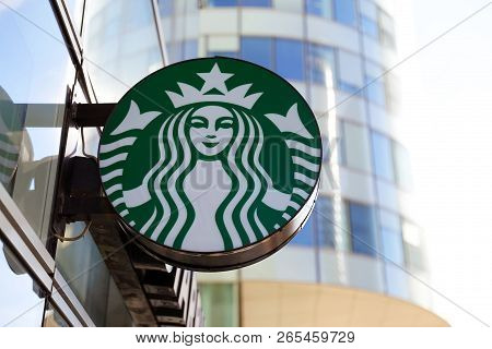 Paris, France - October 16, 2018: Starbucks Coffee Shop Mermaid Logo Is Displayed At The Facade Of A