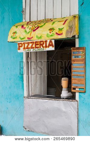 Holguin,  Cuba - Jan 28, 2016: Stall Selling A Street Food Pizza In Holguin