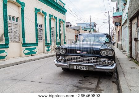 Holguin,  Cuba - Jan 28, 2016: Old Chevrolet In A Street Of Holguin