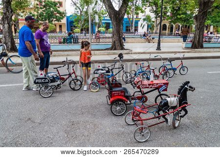 Bayamo,  Cuba - Jan 30, 2016: Tricycles For Children On Cespedes Square  In Bayamo, Cuba