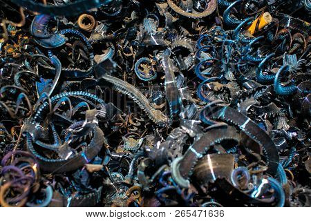 Metal Chips In The Form Of A Spiral Waste From Turning Production For The Design Background