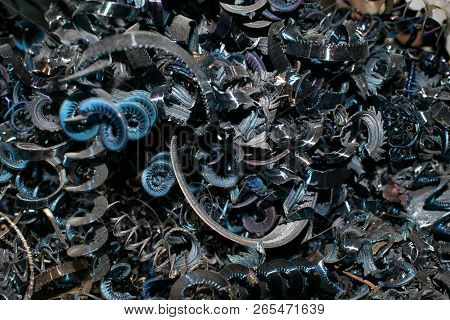 Metal Chips In The Form Of A Spiral Waste From Turning Production For The Design Background
