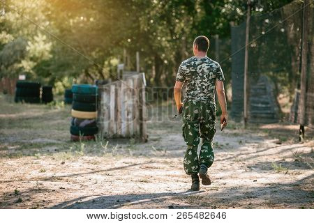 Back View Of Male Lasertag Instructor On Shooting Range