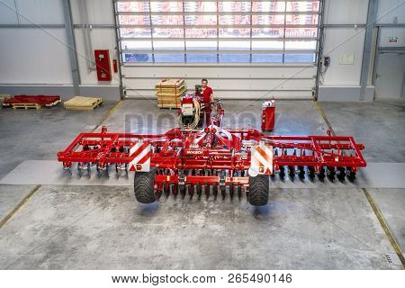 Roshchinsky, Russia - June 21, 2018: Plant For The Production Of Agricultural Machinery. Workers Mak
