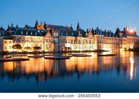Binnenhof Dutch Parliament Next To Hofvijver Lake At Dusk During The Blue Hour. Binnenhof Palace In 