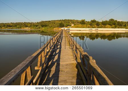 Zvernec, Albania- 29 June 2014: Wooden Ruined Bridge Leading To The Island Of Zvernec With Monastery