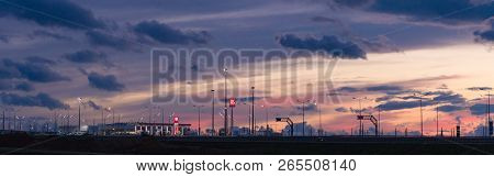 Taman, Russia - October 2018: Lukoil Gas Station On The Crimean Bridge At Sunset, Night. Lukoil Is A