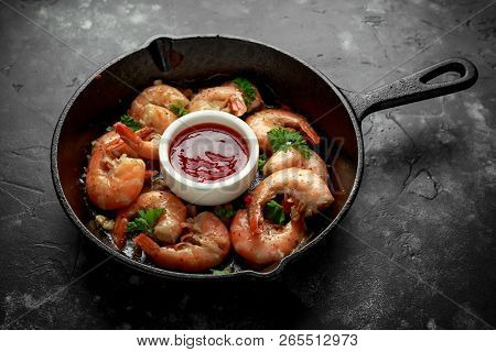Fried In Garlic Butter Shrimps Served With Sweet Chili Suace And Parsley