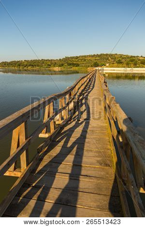 Wooden Ruined Bridge Leading To The Island Of Zvernec With Monastery Of Saint Mary.the Bridge Is Loc