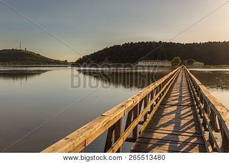 Wooden Ruined Bridge Leading To The Island Of Zvernec With Monastery Of Saint Mary.the Bridge Is Loc