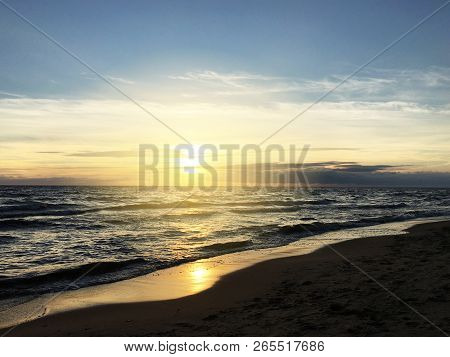 Sunset Over The Sea