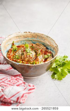 Babaganoush In A Plate On White Background. Plant Based Diet, Vegan Food Concept.