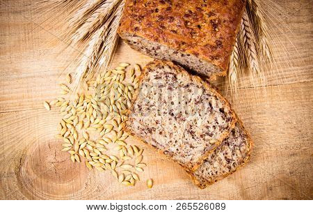 Multi-grain Bread On A Wooden Background. Healthy Food Concept.