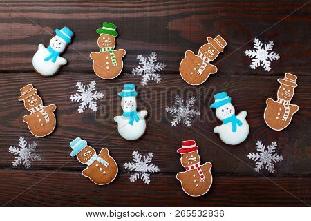Many Differrent Christmas Homemade Gingerbread Cookies Snowman. On Wooden Table.closeup.top View.bac