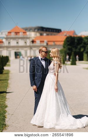Groom Dance With Bride In The Pakr Near The Palace In Wiena, Austria