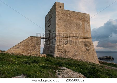 Mgarr Ix-xini Bay Tower Gozo. Malta. Horizontal At Sunset