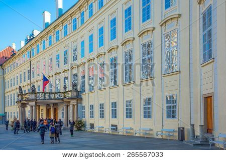 Prague, Czech Republic - December 1, 2012: Castle District,  Tourists On Front Of  The Kralovsky Pal