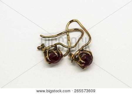 Gold Earrings With Precious Stones Isolated On White