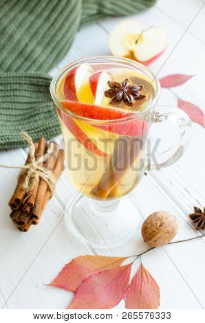Autumn Mulled Wine Or Gluhwein Based On White Wine With Rum, Apple And Spices Cinnamon Sticks, Star 