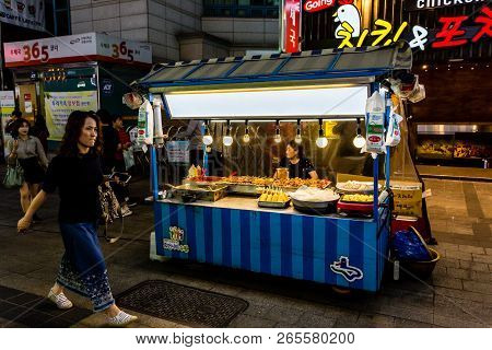 Suwon, South Korea - June 14, 2017: Vendor Woman Waiting Of Buyers In Her Fast Food Kiosk At Main St