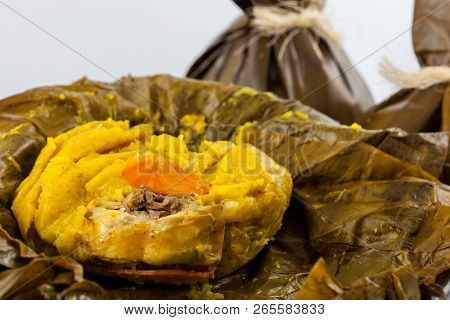 Traditional Colombian Tamale As Made On Tolima Region Isolated On White Background