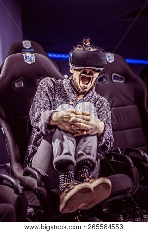 Man In Virtual Glasses Is Watching A Movie In 5D In A Cinema
