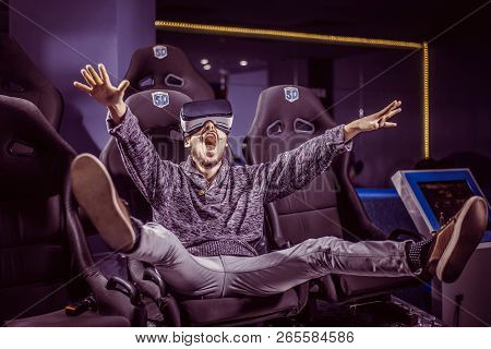 Man In Virtual Glasses Is Watching A Movie In 5D In A Cinema