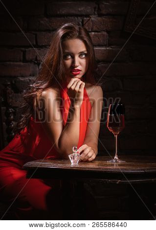 Sad Woman Drink Wine At He Tavern