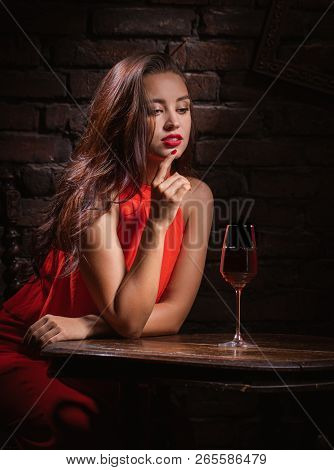 Sad Woman Drink Wine At He Tavern