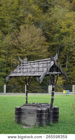 Wooden Well In The Village. Wooden Well In Garden