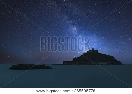 Vibrant Milky Way Composite Image Over Landscape Of St Michael's Mount Bay Marazion Cornwall England
