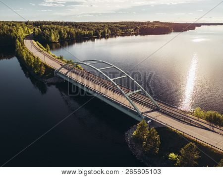 Steel Bridge Over Lake At Suomussalmi Finland On A Sunny Evening