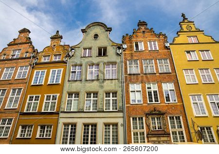 Facade Of Beautiful Typical Colorful Houses Buildings On Piwna Street In Old Historical Town Centre 