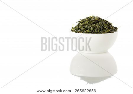 Green Sencha Tea In White Cup Isolated On White Background.