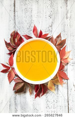Pumpkin Soup With The Dry Autumn Leaves
