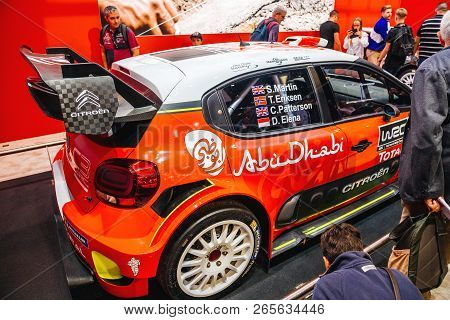 Paris, France - Oct 4, 2018: Adult Customers Curious People Admiring New Sport Rally Citroen C2 Wrc 