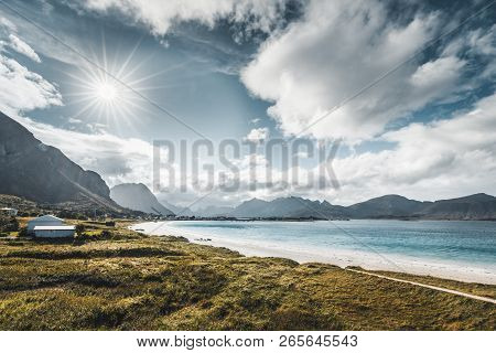 A Typical Lofoten Beach View Frames The Sea At Ramberg Lofoten. Scene On A Beautiful Day With Blue S