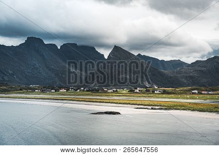 A Typical Lofoten Beach View Frames The Sea At Ramberg Lofoten. Scene On A Beautiful Day With Blue S