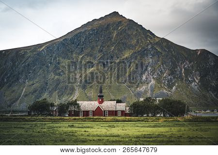 Flakstad Church With Mountains In The Background, Exquisite Xviii Century Baroque Masterpiece In The