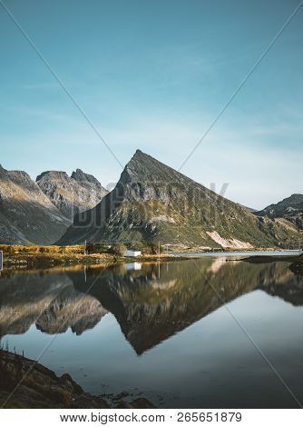 The Stunning Maointain Near Fredvang In Lofoten Islands, Norway Seen From A Drone Aerial With Reflec