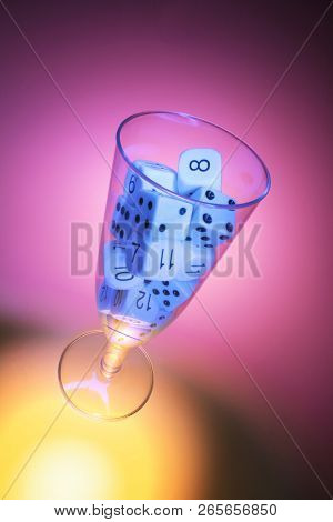Dice In Wine Glass With Red Background