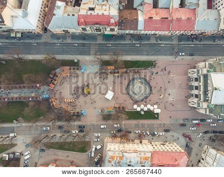 Overtop View Of Square Before Old European Building.