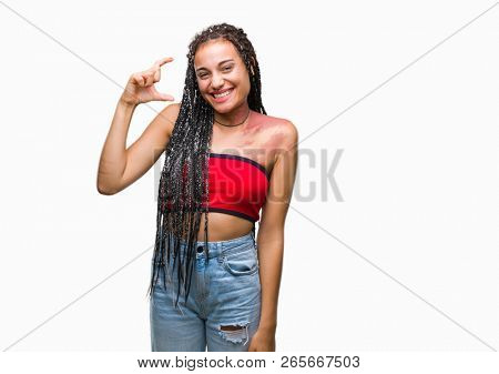 Young braided hair african american with pigmentation blemish birth mark over isolated background smiling and confident gesturing with hand doing size sign with fingers while looking and the camera
