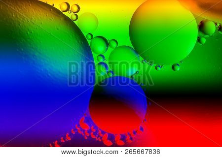 Abstract Background With Colorful Gradient Colors. Oil Drops In Water Abstract Psychedelic Pattern I