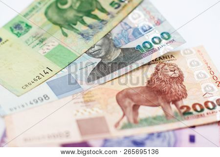 Top View Of Banknotes Of Tanzanian Shilling Different Denominations Closeup Isolated On White Backgr