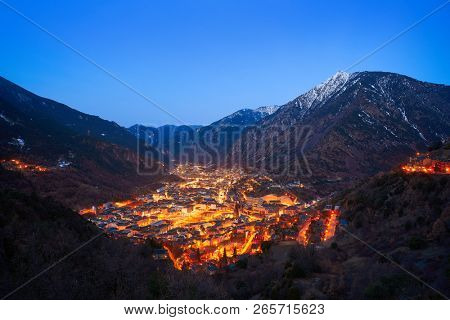 Andorra la Vella skyline at sunset in Pyrenees mountains