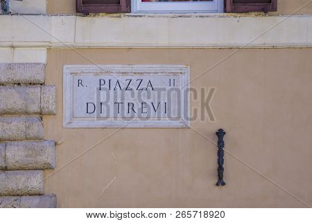 Trevi Fountain, Tourist Attraction In Rome, Italy. Street Sign Of Piazza Trev.i
